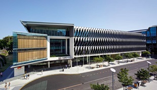Broadcasting studios have a prime view of South Bank Parklands from the cantilevered glass boxes